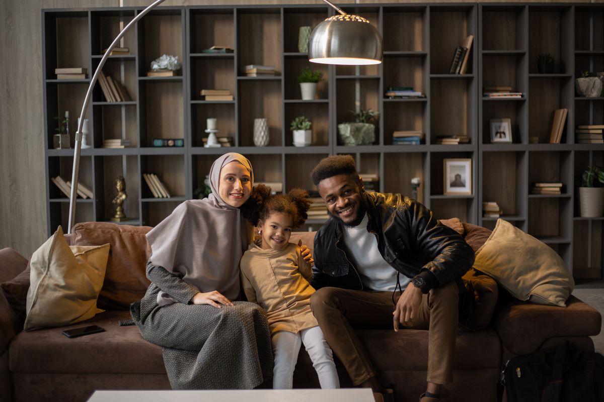 Family seated together in their living room
